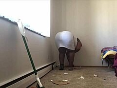 Black MILF cleans in HD