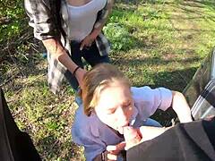 Public outdoor BJ action with cum sharing