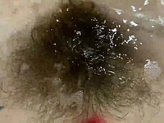 Hairy pussy gets soaked