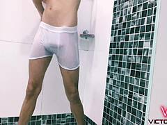 Young gay guy in shower