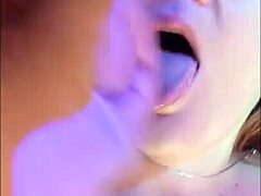 In the homemade video, redhead milf hotwife Steffi slips into her purple chemise. She teases with a sensual PUSSY DANCE, captivating viewers.