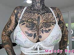 Melody's curves in lingerie showcase.