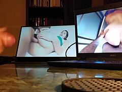 guy masturbates at his desk with computer