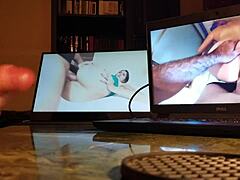 guy masturbates at his desk with computer