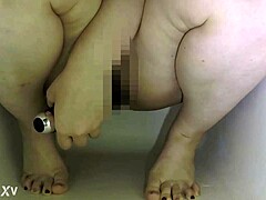 Asian girl masturbates pussy in self-shot video