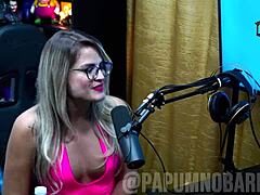 Bruna Carlos shows natural tits and arches ass for presenter.