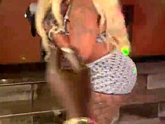 Afrocandy boldly exposes big tits at live show