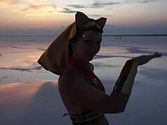 Mature Amateurs Dance Under Pink Sky With White Salt