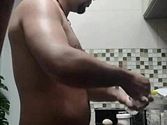 Watch macho guy washing dishes naked in doggystyle