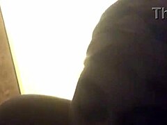 black performer gives a blow job in the scene with detailed focus on the act