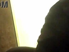 black performer gives a blow job in the scene with detailed focus on the act