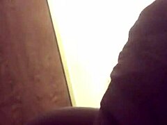 black performer gives a blow job in the scene with detailed focus on the act