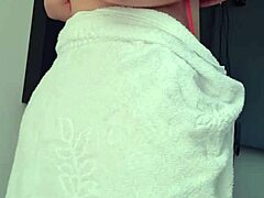 Latina woman displays natural features by the window