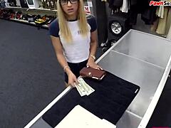 Glasses girl shows pawnshop clerk