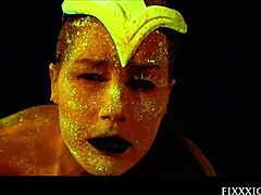 this glow in the dark goddess is masturbating with a dildo, she's so horny and fingering herself solo