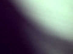 A british european couple enjoys a quiet evening together in their home.