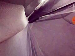 Wife gives husband BJ in intimate couple moment.