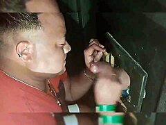 I took my friend to the blowjob booth for gay oral action.