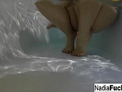 sexy nadia bathes and masturbates with rubber duckies in the tub