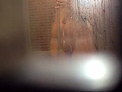 Solo girl pleasures herself in shower