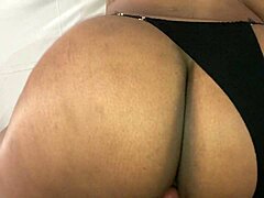 Ebony babe sits hard on big black cock.