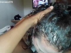 Transsexual with big tits sucks black guy's cock deeply