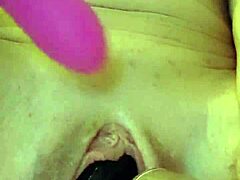 The greedy, pumped-up pussy of this amateur brunette milf squirts with excitement during intense masturbation