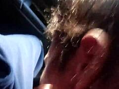 Brazilian shemale gives oral in car.