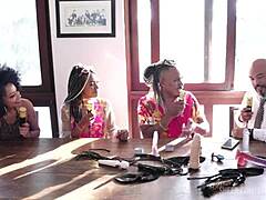 Black couple shines at sensual event in sheer red