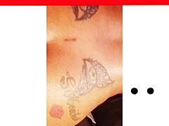 Npleasures, showing off her new ass tattoo while bent over!