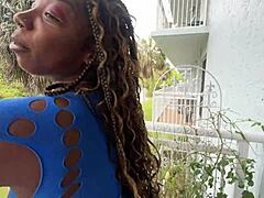 lucy hayz waters the plants sensually in the bedroom with curly hair