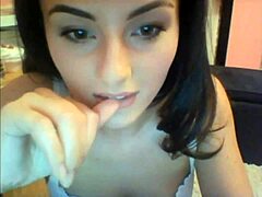 Sexy college girl strips on cam.