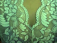 Amateur couple plays with big tits in stockings.