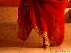 Seductive brunette milf performs striptease dance 😊