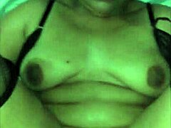 With my red dress on, I ride my girlfriend's big tits and ass