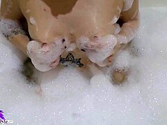 Cute babe sloppy sucks huge dildo in bath