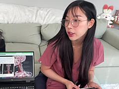 the medical student elle lee returns the favor to her tutor in a helpful exchange during their session. she assists with studies and shares knowledge in the academic setting.