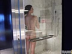 Small-boobed transsexual takes a shower