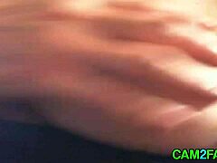 Close-up webcam action: self-fingered