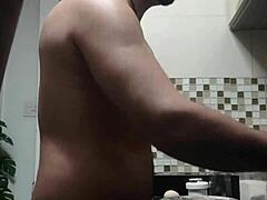 Macho guy bent over washing dishes 😏