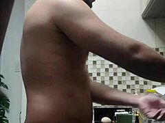 Macho guy bent over washing dishes 😏