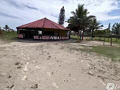 Beach massage with an African beauty