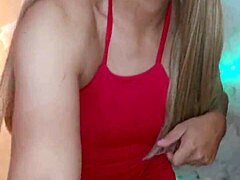 Is that hot transsexual in red ready for action?