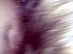 amateur blonde woman shares a homemade moment with hand movements and smiles