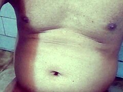 An old indian man enjoys a refreshing golden shower