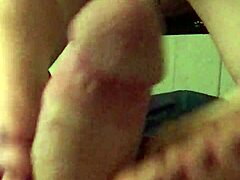 Husband enjoys footjob from cute skinny wife