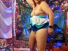 Redhead In Cosplay Rides Toy During Halloween Photoshoot