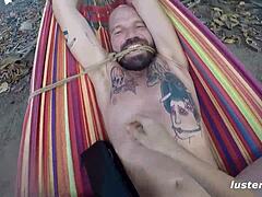kinky couple has outdoor hammock sex with bondage and blowjob!