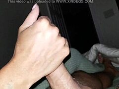 Amateur gives oiled handjob with lots of precum