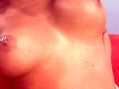 Flaming hot brunette babe with pierced nipples gets doggy style fucking